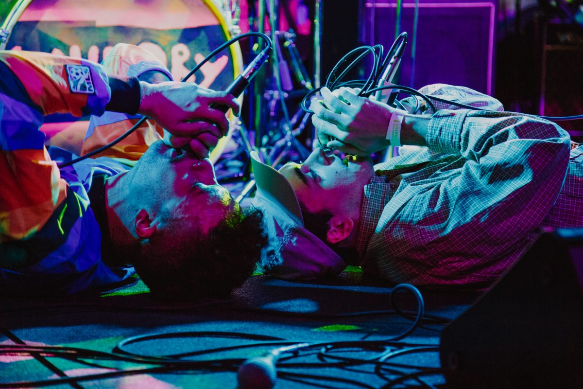 Breakfast Boys Brax (left) and Smyth (right) have a playful and unpredictable stage synergy. During a instrumental break, the two rappers roll into each other on stage, tangling their legs in the air and ultimately resting with their heads side-by-side. Smyth raps a few bars while Brax screams into the mic with both lyrical whimsy and pessimism. (Sarah Northrop/Ethos)