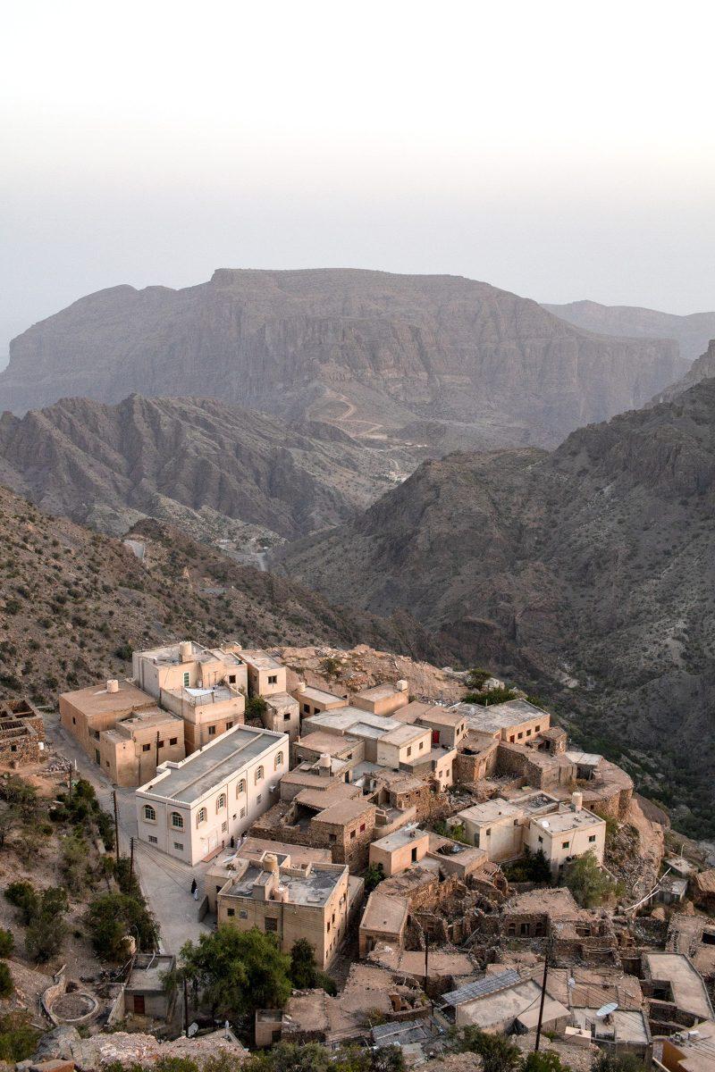 An old, mountainside village not far from Abdulaziz al-Balushi&#8217;s rental home stands in contrast to the modern houses around it. According to al-Balushi, the village has been on Jebel Akhdar for decades and the Omani government has made many attempts to demolish the village and relocate the people living there. He said the government views the village as an eye-sore on their popular tourist attraction, but the people living in the village refuse to leave their home.&#160;Photograph by Payton Bruni.