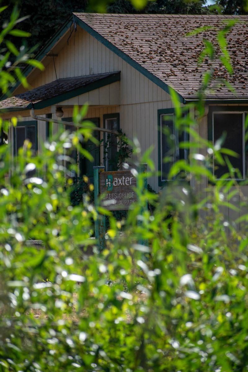 The J.H. Baxter sales office, located on the northeast end of the property, is seen from Alva Park Drive, one of many residential neighborhoods located near the facilities.