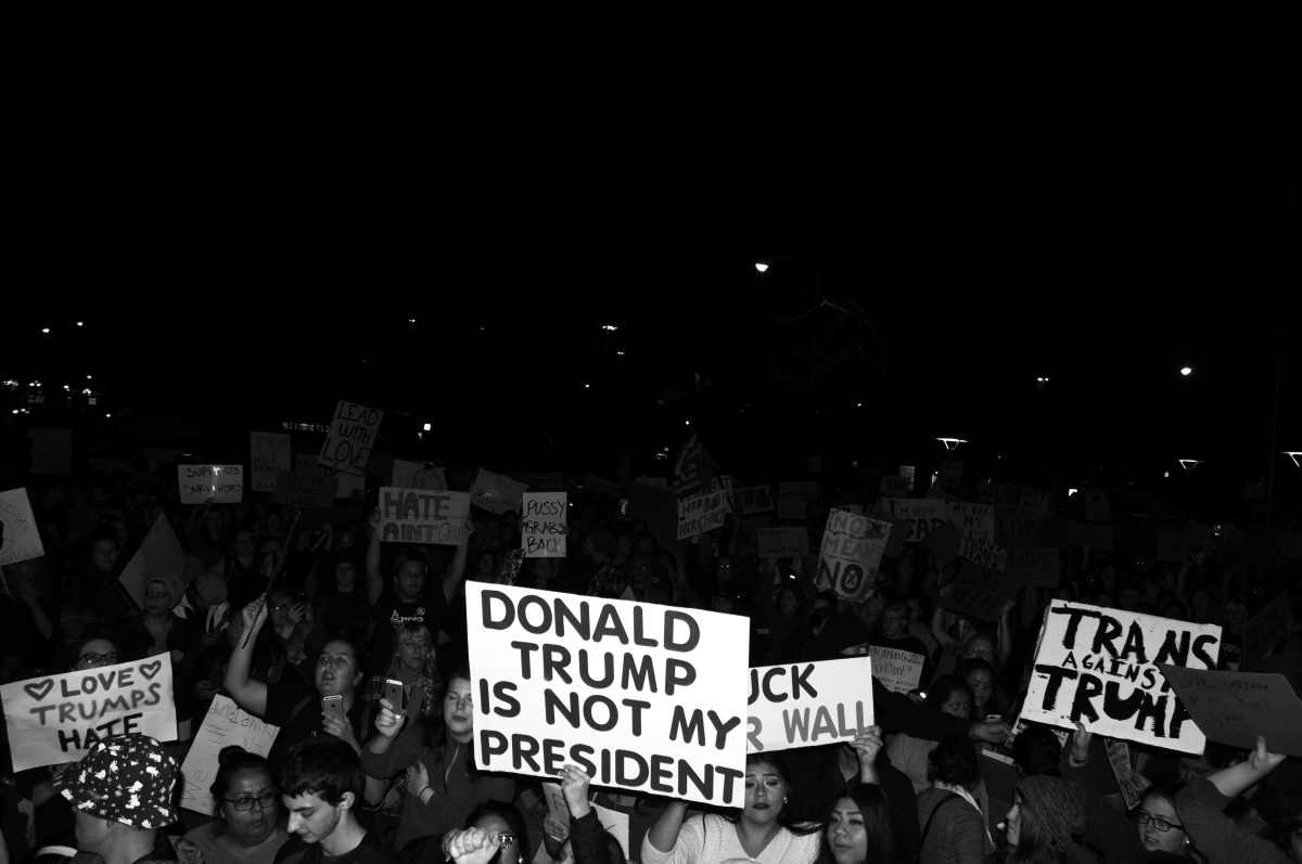 <p>(Students and members of the Eugene community protest at various rallies and marches against new President-elect, Donald J. Trump. – Photo by Phillip Quinn)</p>