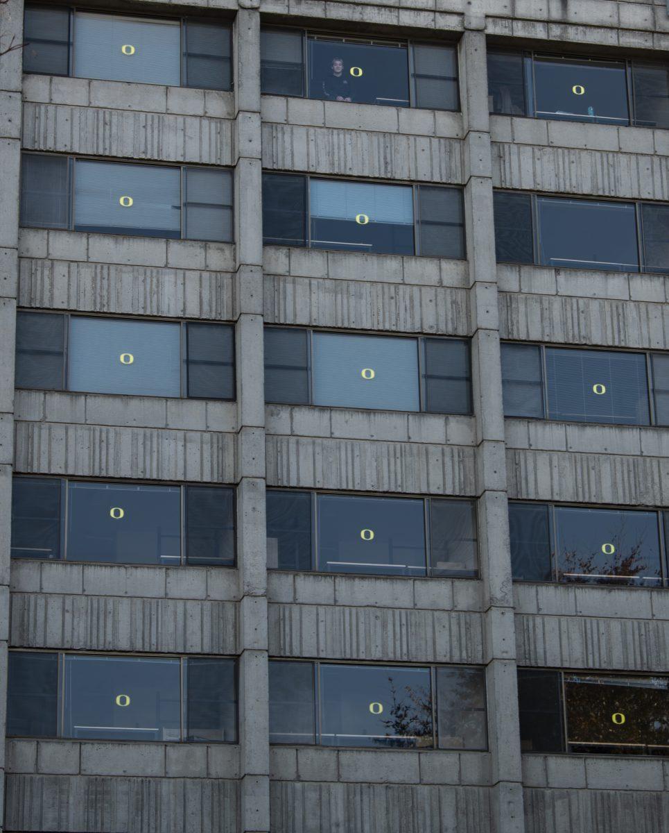 Christian Binder peers out of his seventh-story window in Barnhart Hall, the designated quarantine building for students who have either contracted or come into contact with the coronavirus. Binder says he was given one hour to pack his things once his roommate was alerted of his positive test result. &#8220;We&#8217;re only allowed out between 1 and 3 p.m.,&#8221; Binder says. "I'm so ready to get out of here."