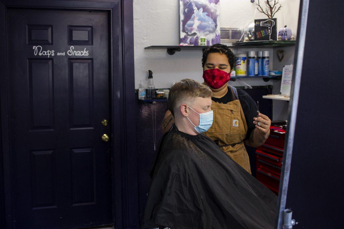 Mercedes Ruby, a barber at Anomaly Hair Collective, says she loves the confidence a haircut can give people. &#8220;As soon as I take the cape off, they see themself in their normal clothes and they get kind of peacock-like,&#8221; she says. &#8220;It makes me happy to make other people happy.&#8221;