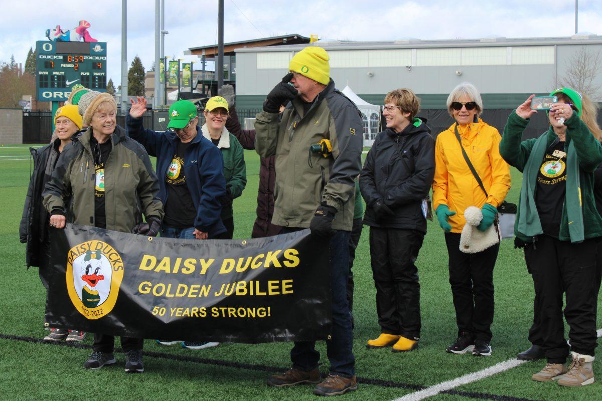 At the women&#8217;s lacrosse game, the Daisy Ducks gathered at mid-field to be recognized. With smiles on their faces, the Daisy Ducks celebrate 50 years as an organization.