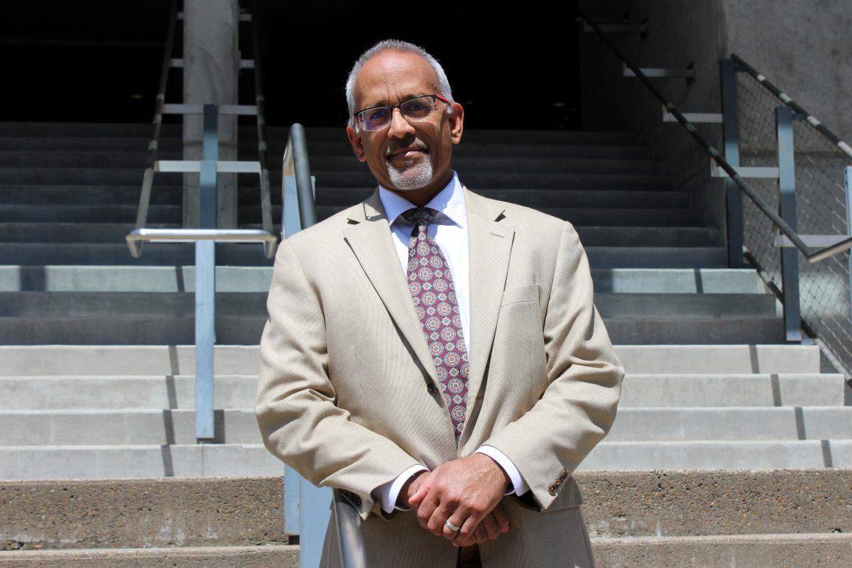 Judge Mustafa Kasubhai stands tall in front of the Lane County Circuit Courthouse before he heads out to Washington D.C. for the week.