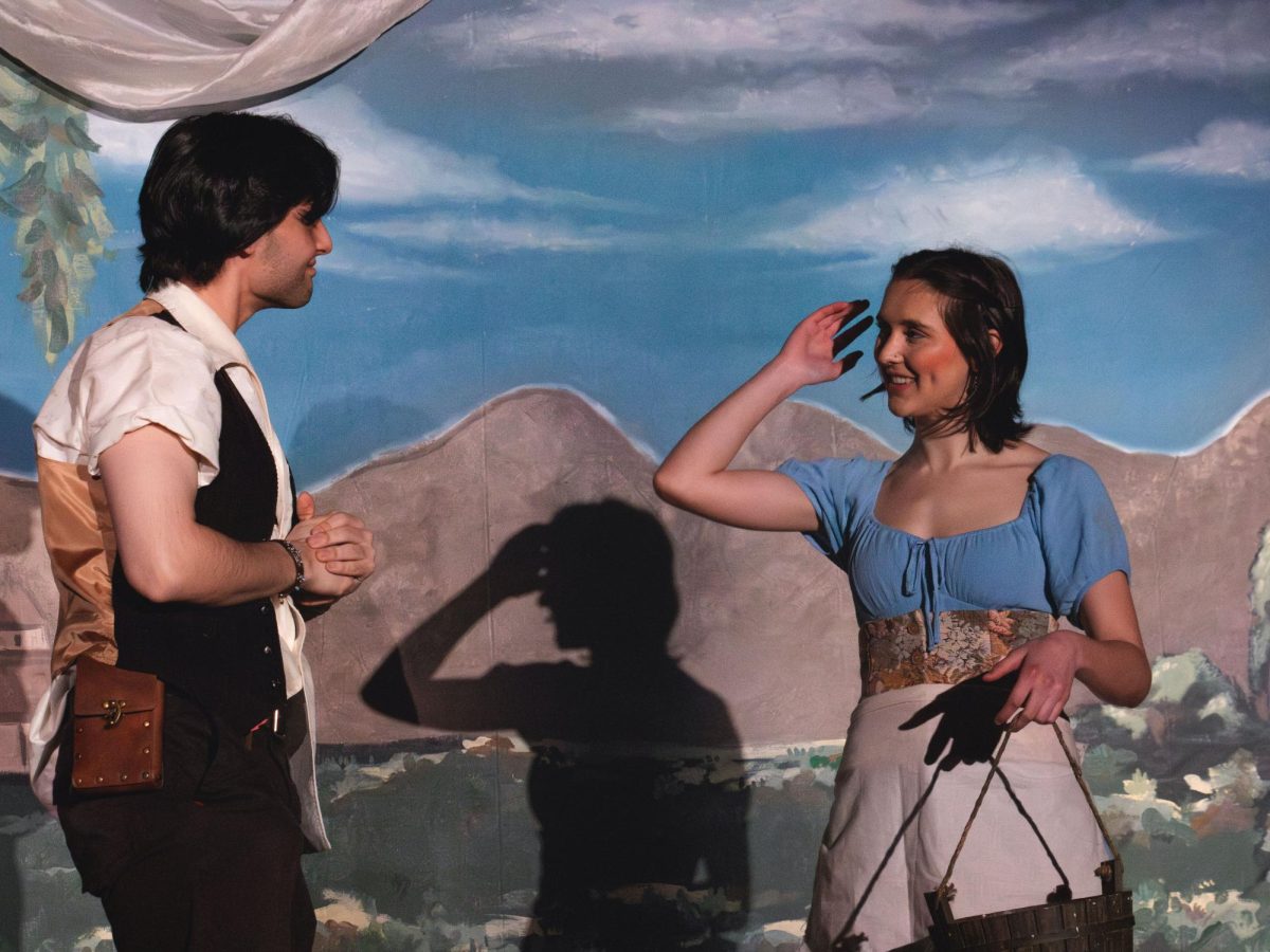 Trevor Tarantino (left) and Emma Shipley (right) perform in "Pandora and the Sickle Moon" for The Pocket Playhouse